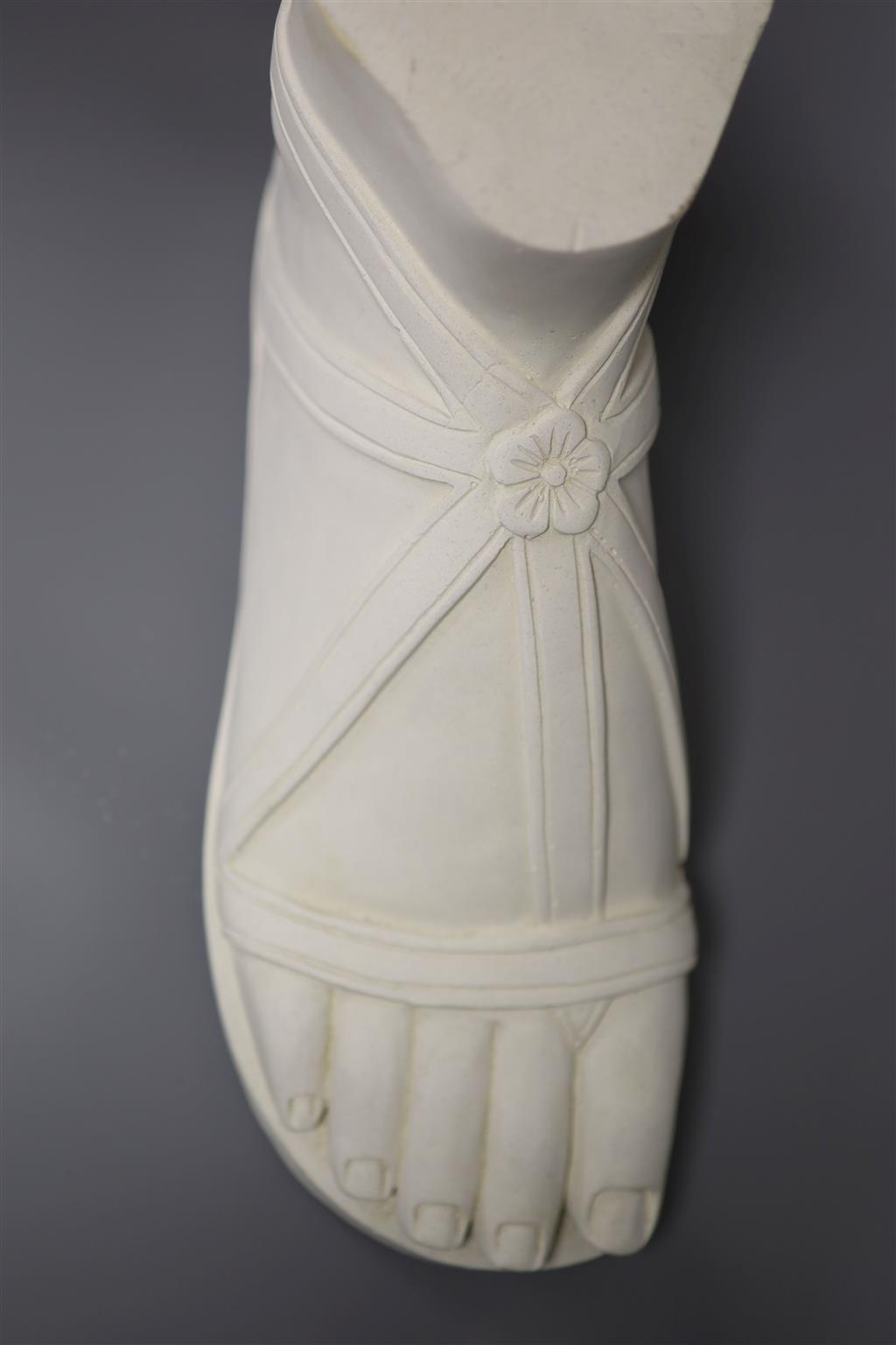 A cast plaster model of a gladiators foot, length 37cm